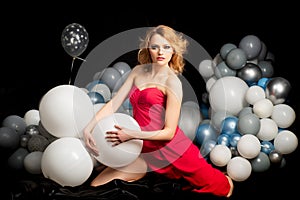 Elegant woman with balloons. Celebration, party, holidays. Present gift.