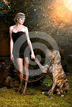 Elegant woman with big dog