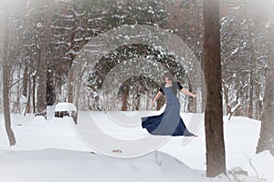 Elegant Woman Dancing in Snow