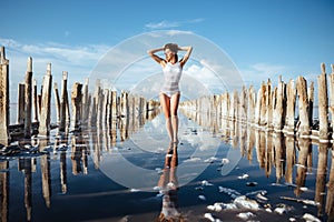 Elegant woman dancing on water.