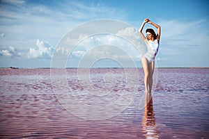 Elegant woman dancing on water.