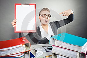 Elegant woman with empty clipboard.