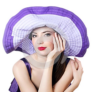 Elegant woman in a lilac hat