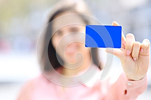 Elegant woman showing black credit card mock up