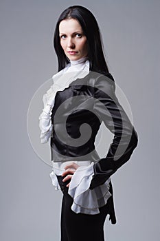 Elegant woman in tailcoat
