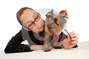 Elegant woman with Yorkshire Terrier