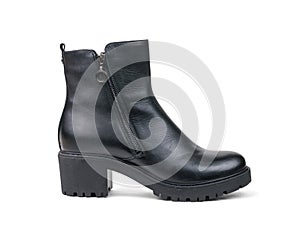 Elegant women`s leather black ankle boots isolated on a white background