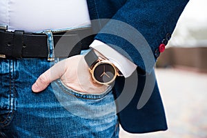 Elegant young business man`s hand with fashion no brand wrist wa