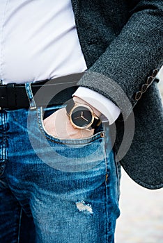 Elegant young business man`s hand with fashion no brand wrist wa