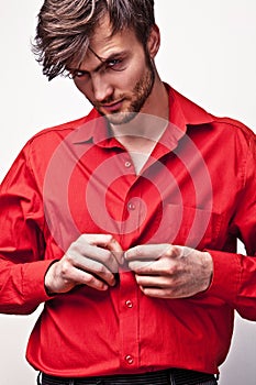 Elegant young handsome man. Studio fashion portrait.