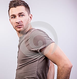 Elegant young handsome man. Studio fashion portrait.