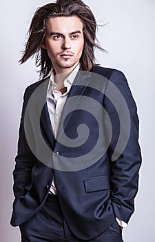 Elegant young handsome man. Studio fashion portrait.