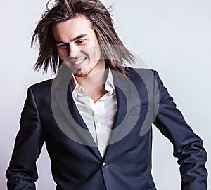 Elegant young handsome man. Studio fashion portrait.