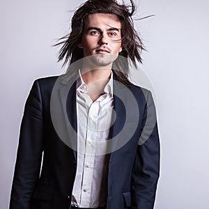 Elegant young handsome man. Studio fashion portrait.