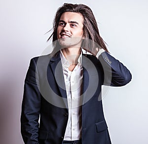 Elegant young handsome man. Studio fashion portrait.