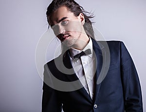 Elegant young handsome man. Studio fashion portrait.