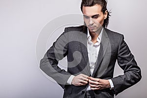 Elegant young handsome man. Studio fashion portrait.