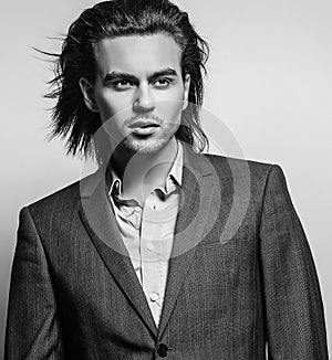 Elegant young handsome man. Studio fashion portrait.