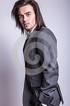 Elegant young handsome man. Studio fashion portrait.