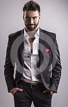 Elegant young handsome man. Studio fashion portrait.