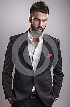 Elegant young handsome man. Studio fashion portrait.