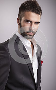 Elegant young handsome man. Studio fashion portrait.