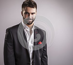 Elegant young handsome man. Studio fashion portrait.