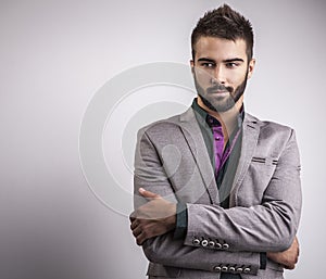 Elegant young handsome man. Studio fashion portrait.