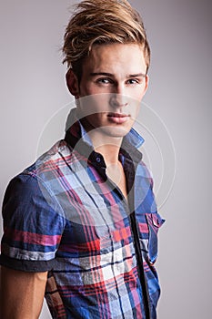 Elegant young handsome man. Studio fashion portrait.