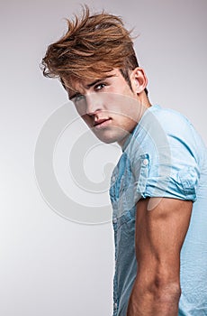 Elegant young handsome man. Studio fashion portrait.