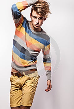 Elegant young handsome man. Studio fashion portrait.