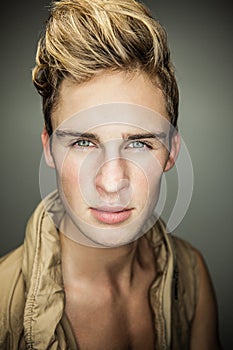 Elegant young handsome man. Studio fashion portrait.