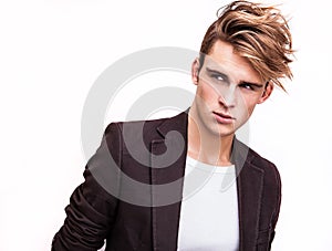 Elegant young handsome man. Studio fashion portrait.