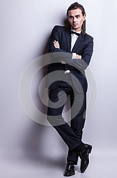 Elegant young handsome man. Studio fashion portrait.