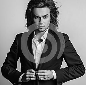 Elegant young handsome man. Studio fashion portrait.