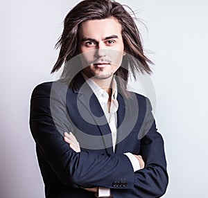 Elegant young handsome man. Studio fashion portrait.