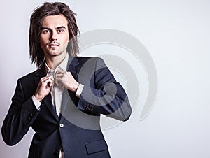 Elegant young handsome man. Studio fashion portrait.