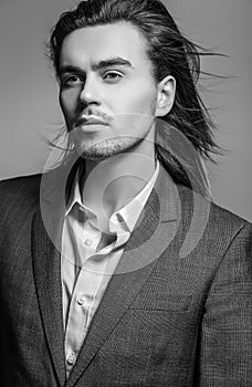 Elegant young handsome man. Studio fashion portrait.