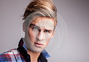 Elegant young handsome man. Studio fashion portrait.