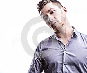 Elegant young handsome man. Studio fashion portrait on bright background.