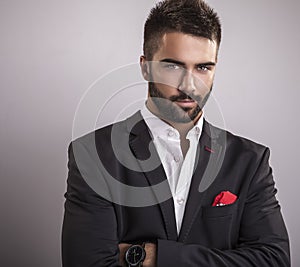 Elegant young handsome man. Studio fashion portrait.