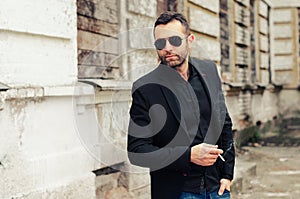 Elegant young handsome man wearing suit