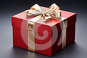 Elegantly adorned: Red gift box, golden ribbon, and exquisite bow.