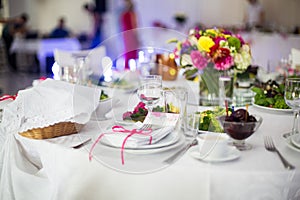 Elegantly catered luxury white tableware at wedding