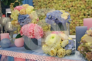 Elegantly decorated table with candles and flowers