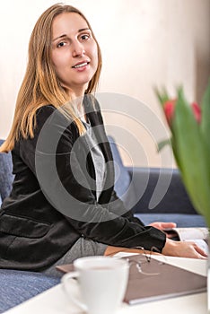 Elegantly dressed young brunette woman vertical