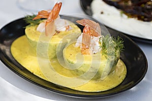 Elegantly presented shrimp dinner on a luxury restaurant table