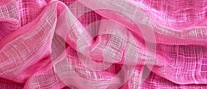 Elegantly swirling pink fabric with a fine mesh texture, conveying softness and luxury in a close-up shot. Burlap fabric
