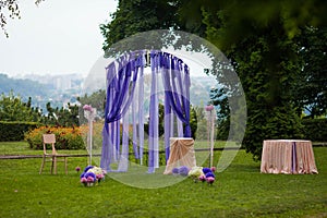 Elegantly tasteful decorated with flowers and ribbons wedding ar