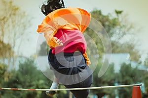 Elemantary Students Grade 3 take exams High jump.